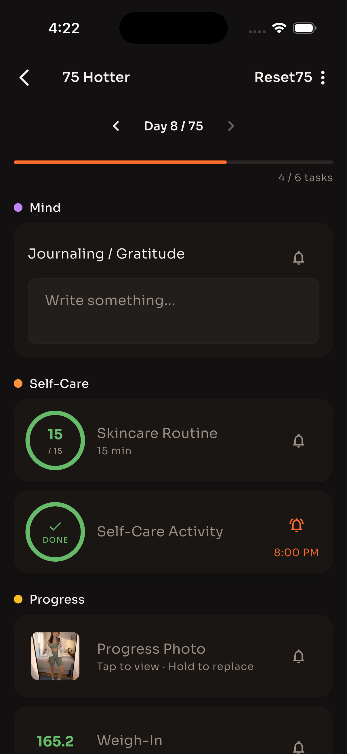 Reset75 daily logging screen with journaling, skincare routine, and self-care activity tasks